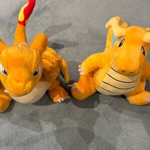 Plush Pokémon Charizard and Dragonite